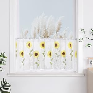 Brise-bise transparent avec broderie de marguerites