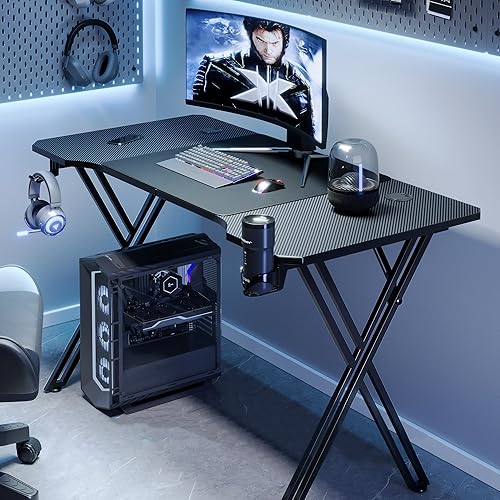 XMTECH Bureau Gaming 120x60 - Table Gaming Cadre en X avec Surface en Fibre de Carbone Stable - avec Porte-gobelet et Crochet pour Casque - Noir - Nail Gallerys